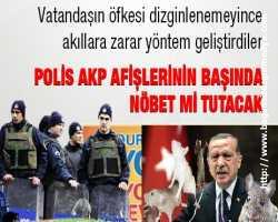 Polis AKP Afişlerini koruyor...