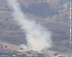 Yol kesen PKK'lılar,4 aracı ateşe verdi